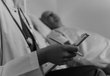 Asbestos Exposure and Its Lasting Impact on Veterans’ Health Photo by Tima Miroshnichenko: https://www.pexels.com/photo/doctor-holding-a-medical-chart-sitting-beside-a-patient-6010779/