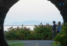 August 17, 2026: Thunder Bay Weather — Fog Clears for a Sunny 25°C Monday Before Showers Tonight Couple walking at Marina Park with Sleeping Giant in background