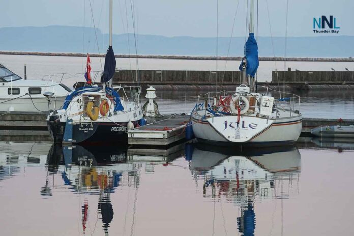 Two sailboats docked Marina Park Sept 2025