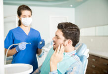 How to Choose Between Dental Implants and Dentures and Make the Decision That Is Right for You Image by tonodiaz on Freepik