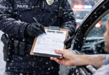 Traffic Paralegal Services: traffic law consultation in Ontario for everyday drivers Police officer issuing traffic ticket