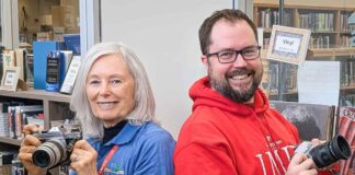 Confederation College Donation Gives Vintage Cameras New Life Fran Duke, President of the Friends of the Thunder Bay Public Library & Orion Atkinson, IMD Program Coordinator at Confederation College