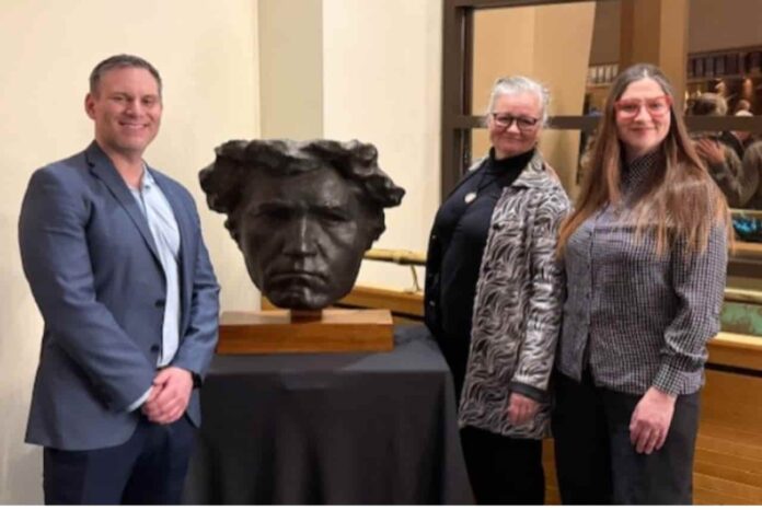 A bust of Ludvig van Beethoven was generously donated to the TBCA by the Browne family. From left to right: Andrew Edwards, Acting General Manager, TBCA, Sylvie Browne, Aurora Browne.