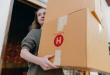 5 Essential Packing Tips for Long-Distance Moves Photo by Ketut Subiyanto: https://www.pexels.com/photo/young-female-carrying-cardboard-boxes-while-moving-out-of-house-4246269/