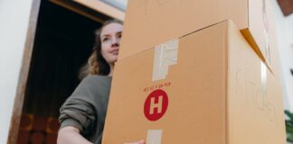 5 Essential Packing Tips for Long-Distance Moves Photo by Ketut Subiyanto: https://www.pexels.com/photo/young-female-carrying-cardboard-boxes-while-moving-out-of-house-4246269/