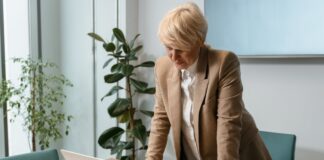 Why Investors Are Pushing Portfolio Companies Toward Fractional Finance Leadership Photo by MART PRODUCTION: https://www.pexels.com/photo/woman-in-brown-suit-jacket-looking-on-a-computer-7222707/