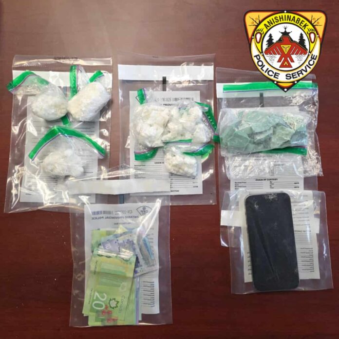 Two males have been arrested and are facing charges after a warrant was executed at a resident in Ginoogaming First Nation