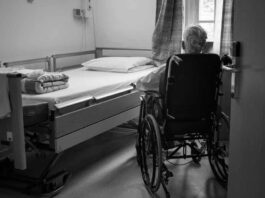 Nursing Home Neglect: What Families Should Know https://unsplash.com/photos/a-person-in-a-wheelchair-in-a-room-fUBZHfDAVmc?utm_source=unsplash&utm_medium=referral&utm_content=creditShareLink