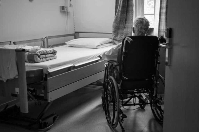 Nursing Home Neglect https://unsplash.com/photos/a-person-in-a-wheelchair-in-a-room-fUBZHfDAVmc?utm_source=unsplash&utm_medium=referral&utm_content=creditShareLink