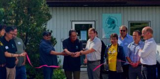 Cat Lake First Nation opens a Dryden natural resources office to expand forestry and energy development Chief Russell Wesley cutting ribbon (left) with Jack Harrison Mayor of the City of Dryden (right)