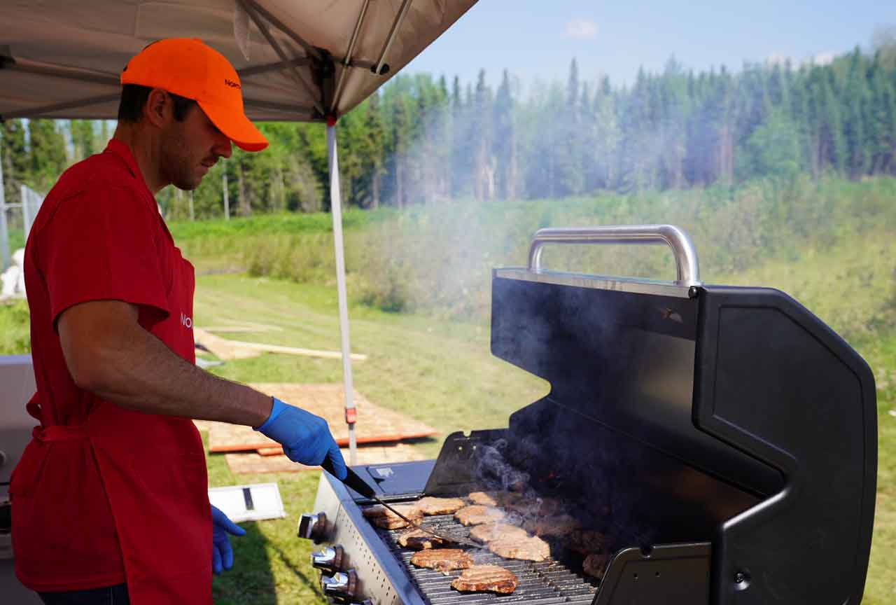 North Star Air President Jeff Stout manning the barbecue