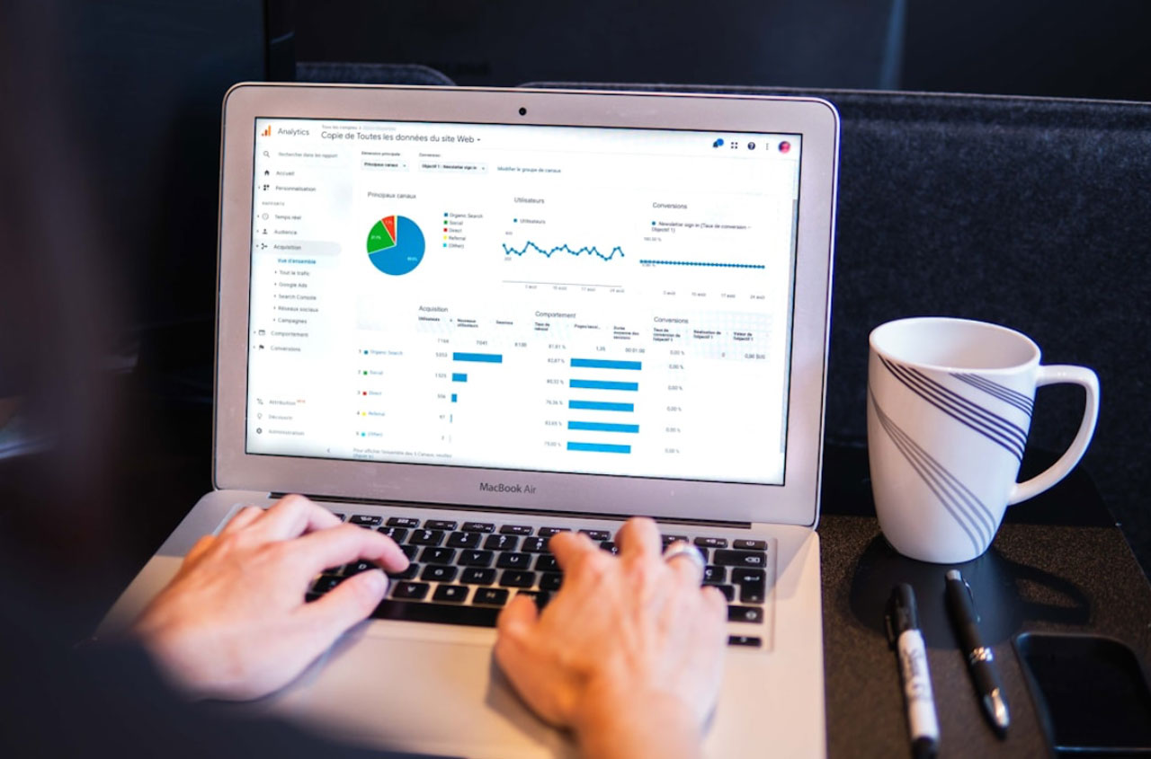 A person using a laptop for data analytics