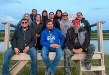 UNDER THE NORTHERN SKY Kattawapiskak Keekehwin Gathering 2026 photo provided by Joseph Kataquapit The Kattawapiskak Keekehwin Gathering committee are a dedicated group of volunteer community members who worked throughout the year to organize the 2026 event which was held from August 2 to 8, 2026. In back L-R are: Linda Kataquapit, Anna Keboke, Flora Iahtail, Lydia Linklater, Fiona Spence, Markiesha Sutherland, RoseAnne Sutherland and Jenny Hookimaw. In front L-R are: Xavier Rose, Joseph (Joojep) Kataquapit and Christopher Kataquapit.