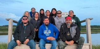 UNDER THE NORTHERN SKY Kattawapiskak Keekehwin Gathering 2026 photo provided by Joseph Kataquapit The Kattawapiskak Keekehwin Gathering committee are a dedicated group of volunteer community members who worked throughout the year to organize the 2026 event which was held from August 2 to 8, 2026. In back L-R are: Linda Kataquapit, Anna Keboke, Flora Iahtail, Lydia Linklater, Fiona Spence, Markiesha Sutherland, RoseAnne Sutherland and Jenny Hookimaw. In front L-R are: Xavier Rose, Joseph (Joojep) Kataquapit and Christopher Kataquapit.