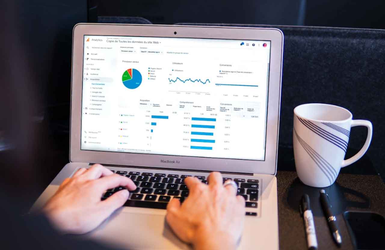 A person using a laptop for data analytics
