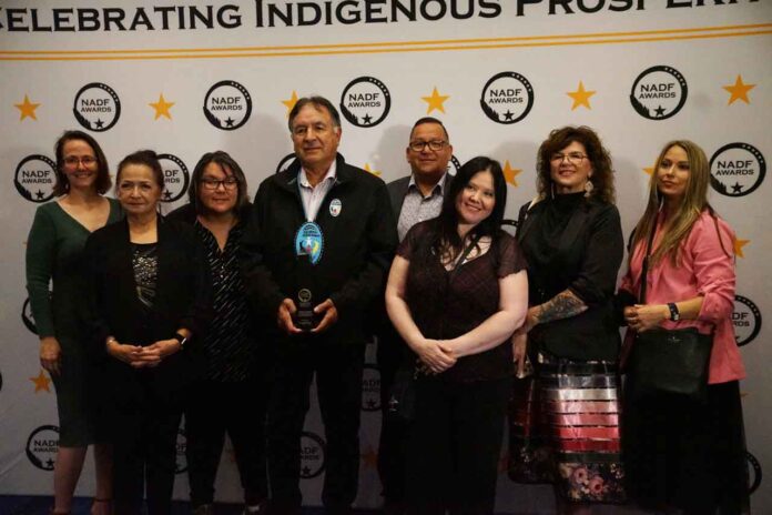 Peter Collins, CEO of Chi Mino Ozhitoowin LP, with the 2026 NADF Excellence in Leadership Award in Thunder Bay on October 22, 2026