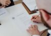 When Relationships Change: Understanding the Legal and Financial Implications Signing Divorce papers