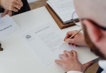 When Relationships Change: Understanding the Legal and Financial Implications Signing Divorce papers