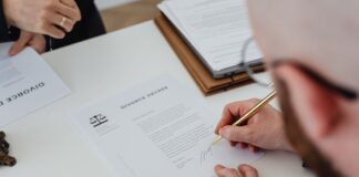 When Relationships Change: Understanding the Legal and Financial Implications Signing Divorce papers