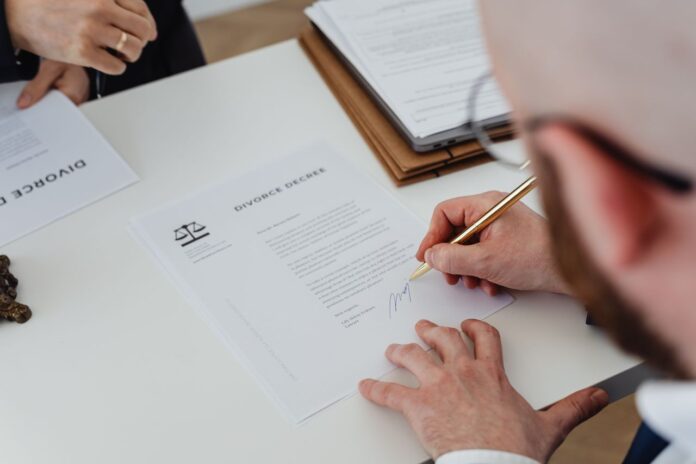 pexels-karola-g-7876037 Signing Divorce papers